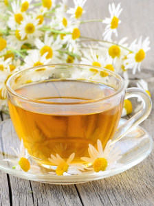 Cup Of Tea With Chamomile Flowers