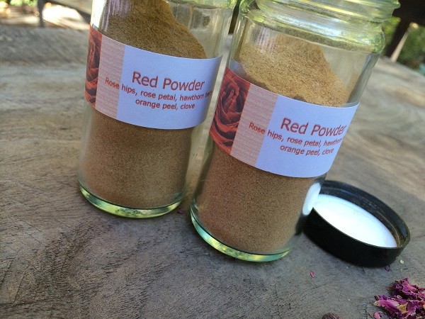 Two Red Powder Bottles